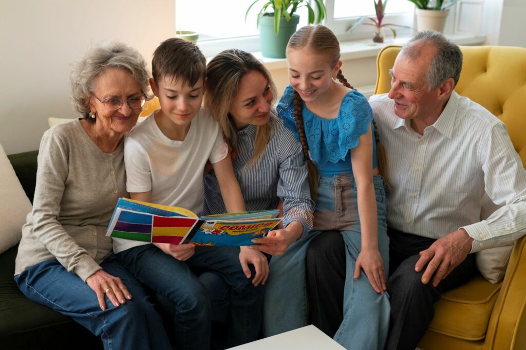 plusieurs génération familiale réunit ensemble partageant un bon moment